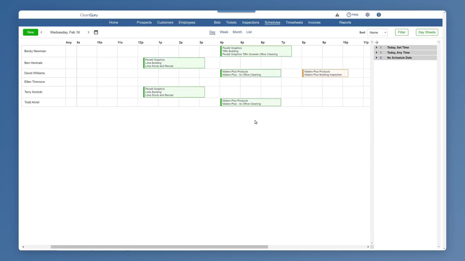 The Day View interface displays staff members on the vertical axis and scheduled time on the horizontal axis.